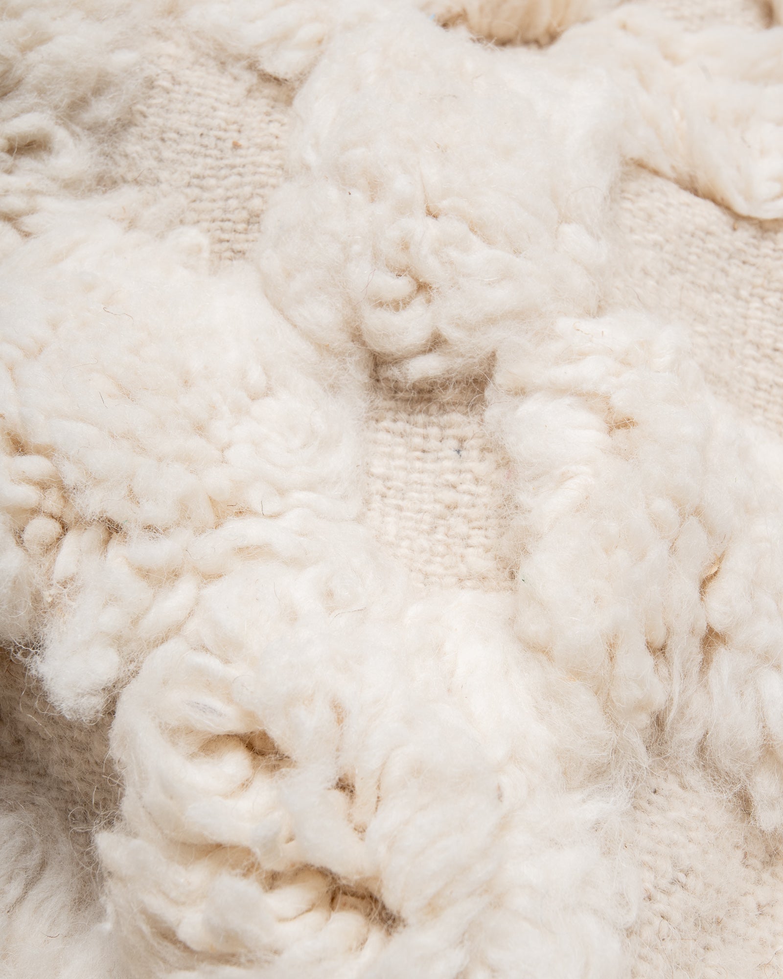Modern, designer, handcrafted Berber rug from Morocco. Beniourain carpet with beautiful colours and patterns and fluffy wool texture.